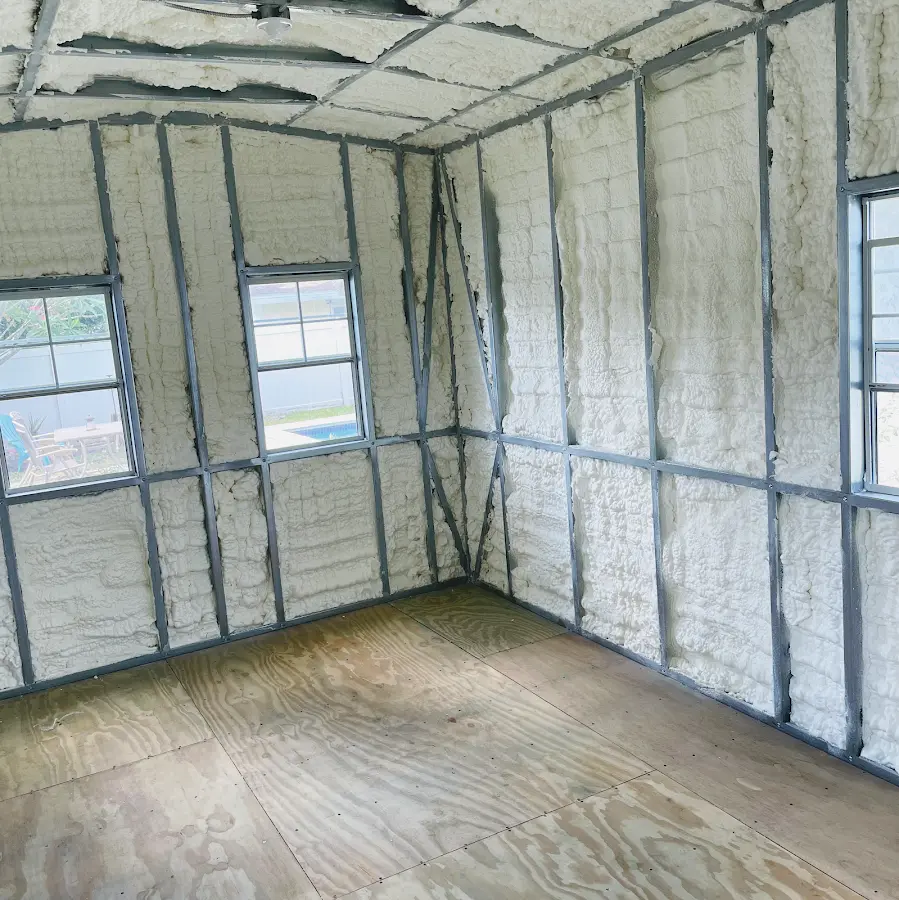 Closed-cell spray foam insulation applied to wall cavities in a residential project in Frederick
